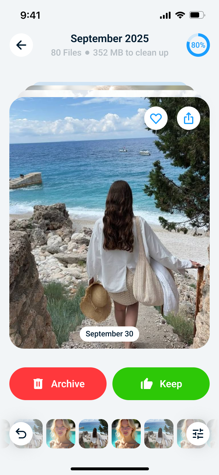 Cleaner Kit AI swipe screen with archive and keep actions below a large photo card.